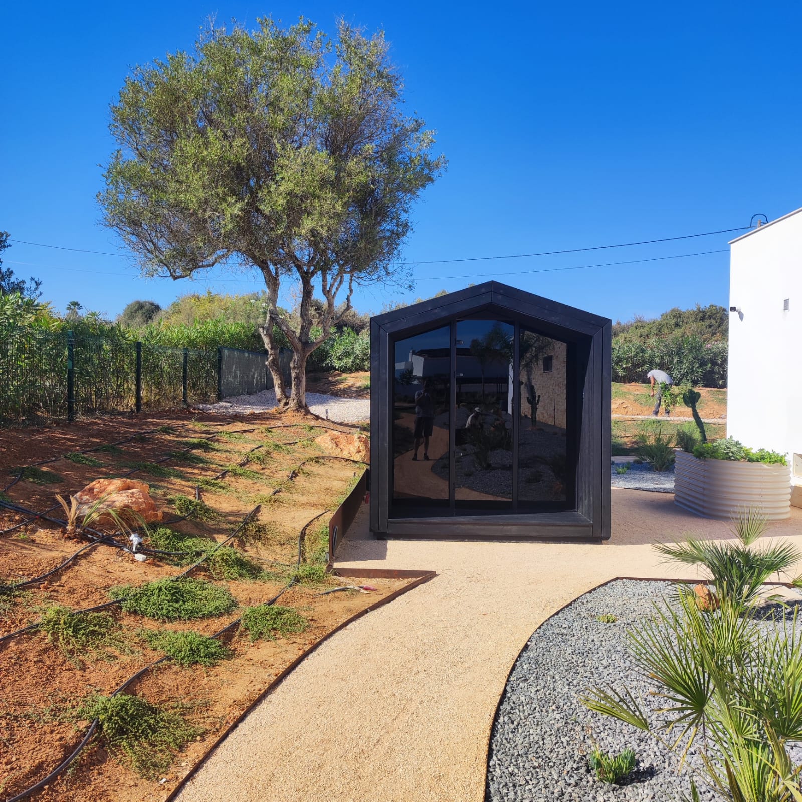 Celsium ELSE Grand outdoor sauna in black Thermowood in a private garden in the Algarve, Portugal